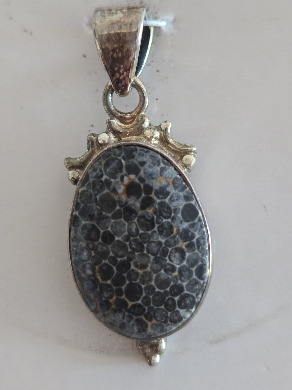 Sterling Silver Black and Gray Oval Fossil Coral Pendant